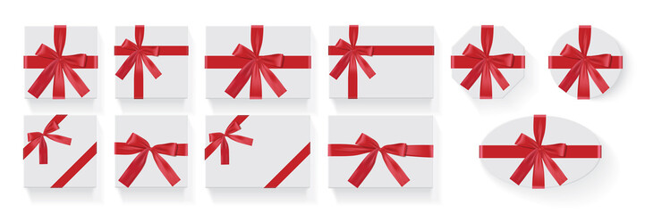 different shapes of boxes with a red bow