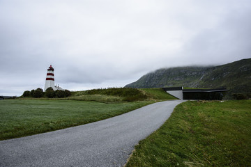 Alnes Lighthouse ,old and famous building ,established in 1852 to guide fishing boats  to the...