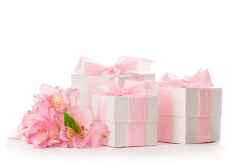 Festive composition of flowers and gifts