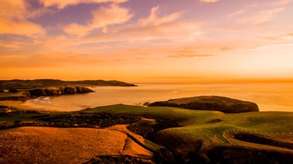 jacks bay neuseeland schöne farben bei sonnenuntergang farmland bay orange © Tim