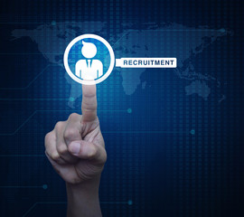 Hand pressing businessman with magnifying glass icon over digital world map technology style, Business recruitment online concept, Elements of this image furnished by NASA