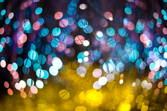 Festive Christmas elegant abstract background with Purple and Neon bokeh lights and stars