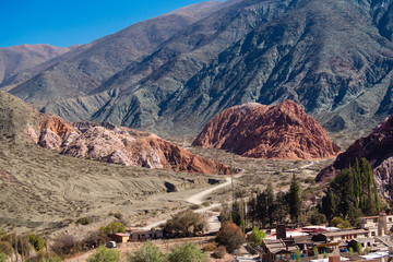 Fototapeta na wymiar Paseo de los Colorados in Purmamarca, 7 colours mountain in northwest of Argentina