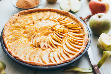 Freshly baked apple pie tart with custard filling
