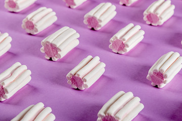 marshmallow pastel shades on a lilac background.marshmallow Colorful pattern on pink pastel background and copy space