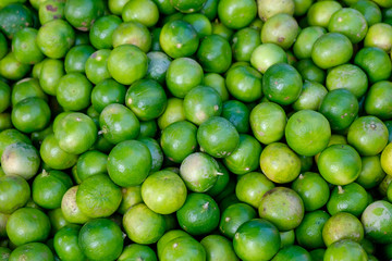 Various Raw Lemons Limes in the Morning Market