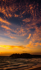 Beautiful Sunset over the Indian ocean on Maldives Resort Island.