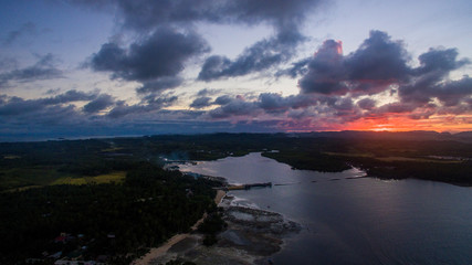 sunset over siargao philippines clouds water aerial view