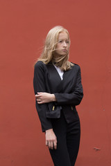Portrait of a young smiling woman isolated on background with copy space