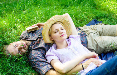 Guy and girl dreamy sleepy enjoy tranquility nature. Couple in love having nap outdoors. Time for...