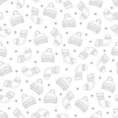 Hand-drawn winter hats and socks. Hats, socks and snowflakes are black on white background. Vector illustration. 