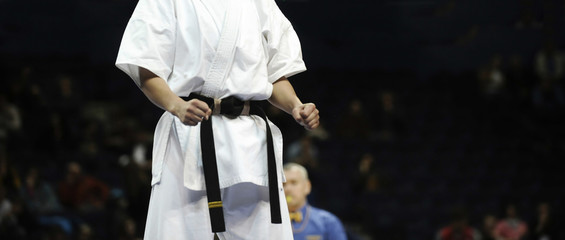 Fototapeta premium Competition athlete woman in Kyokushin karate.