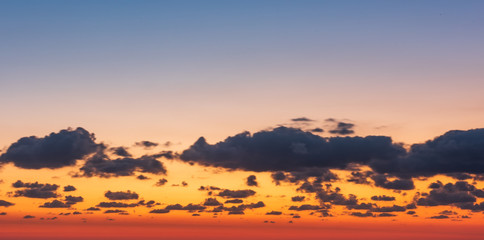 Clouds on colorful sunrise sky
