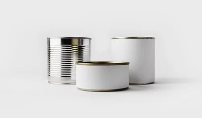 Velvet curtains Product Range Three food tin cans with blank white labels. Responsive design mockup.