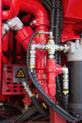 Firefighting equipment on new red fire truck
