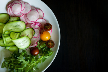 Bowl with ingredients for salad.