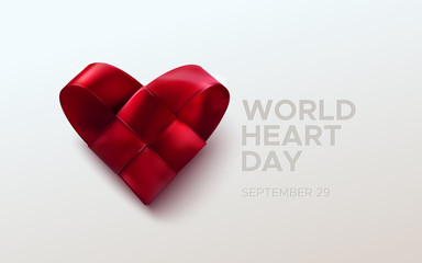 Realistic satin ribbon woven heart with World Heart Day text label. Vector health care illustration. Medical awareness day concept