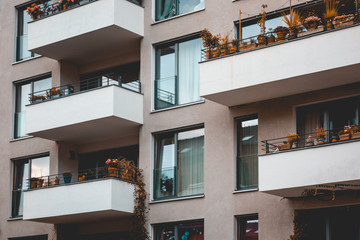 grey facade with white balcony