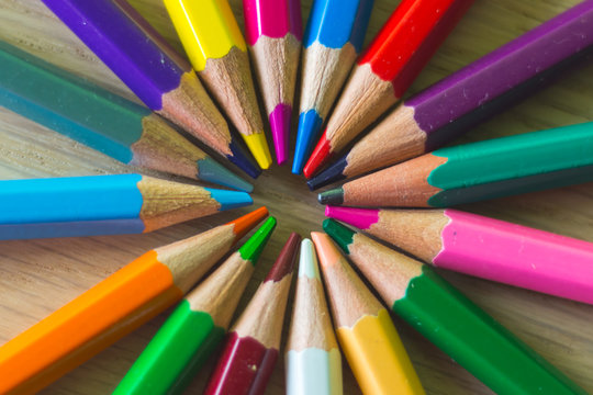 Group of colored pencils making a circle
