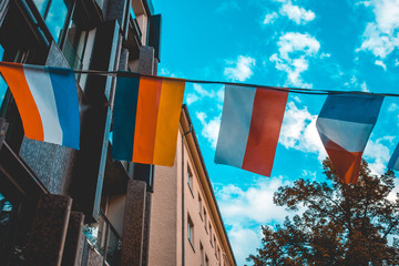 some flags in the air from france, germany, poland and italy