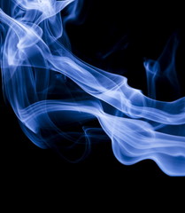 Blue smoke on black background