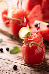 Water melon smothie on wooden table