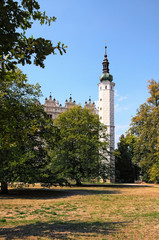 Obraz premium High tower in Litomysl Castle by sunny day. One of the largest Renaissance castles in the Czech Republic. A UNESCO World Heritage Site. Sgraffito painting in the walls. Litomysl, Czech Republic