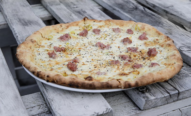 pizza on wooden table