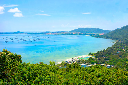 beautiful view of the lagoon with white sand and palm trees, turquoise sea. view from the top.