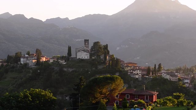 Tuscany twilight rural landscape with house, cypress road and hills