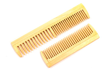 Wooden combs isolated on white background