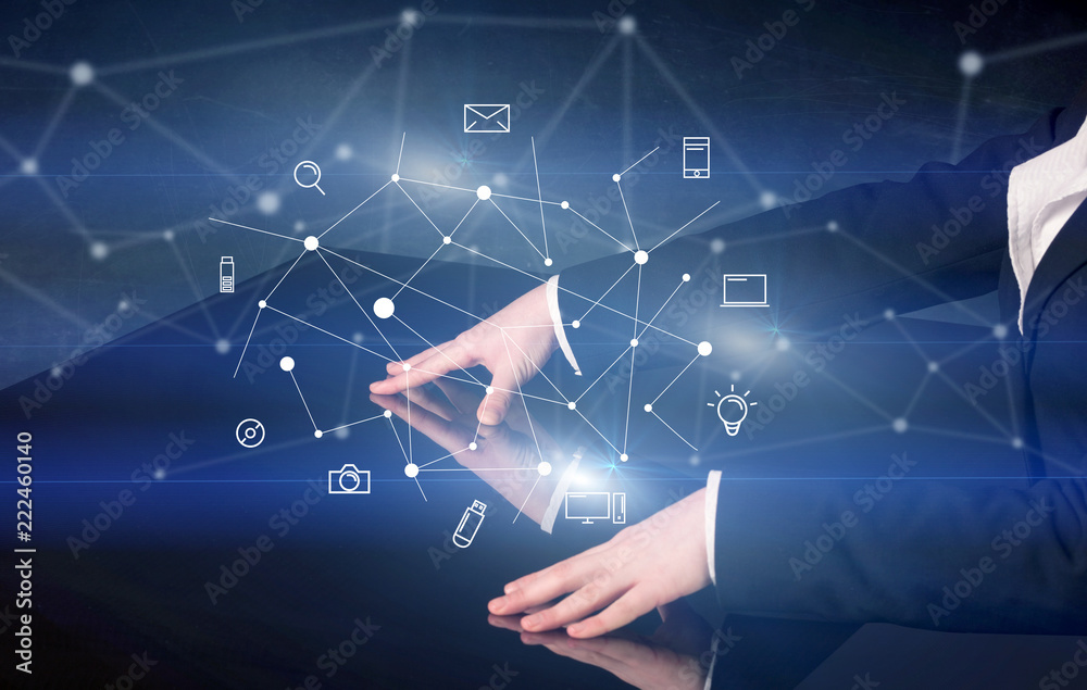 Poster male hands touching interactive table with blue mixed communication icons in the background
