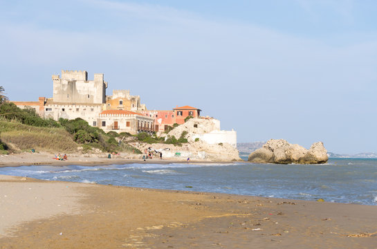 The beautiful castle of Falconara in Sicily seen from the sand beach. It was a sunny summer day in this nice hidden spot located near Butera, Caltanissetta.