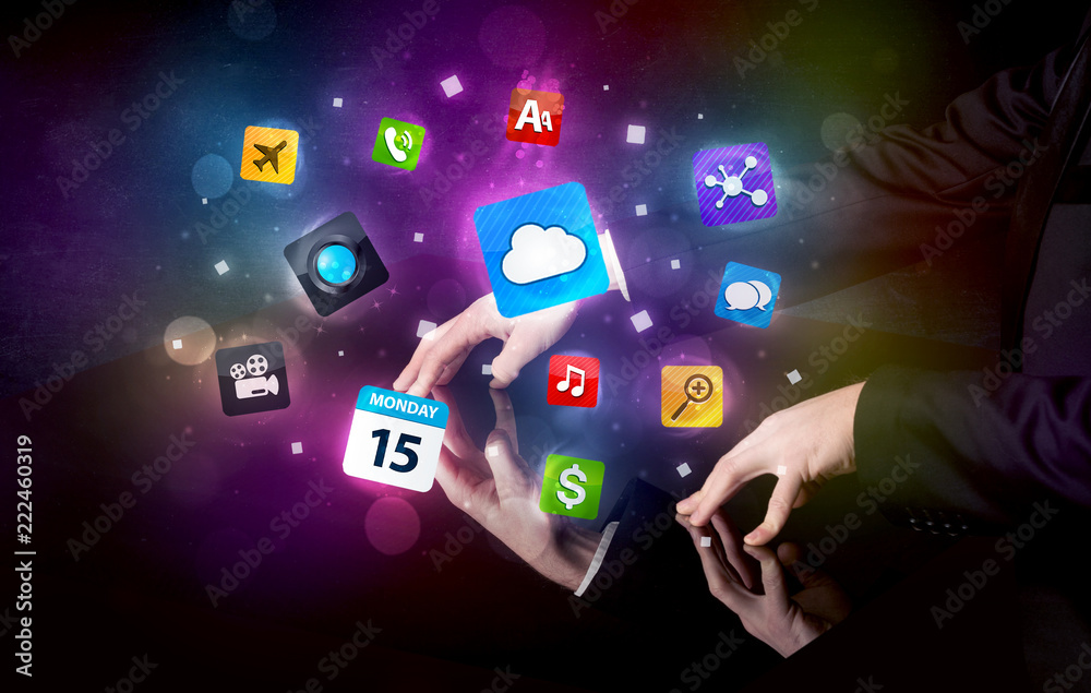 Poster Male hands touching interactive table with colorful application icons on it 