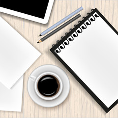 Vector image of a realistic office background. A cup of coffee, a notepad, a tablet, a pen, a pencil and a sheet of paper lying on a wooden table