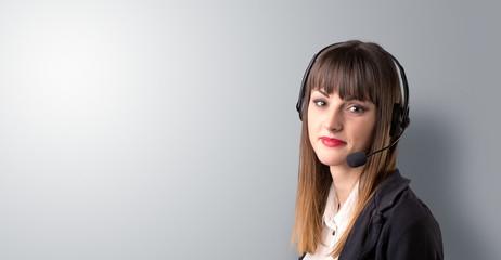 Young female telemarketer on a white background