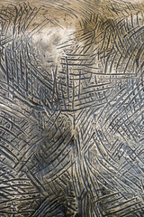 Background of colored copper metal with large scratches 