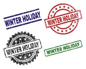 WINTER HOLIDAY seal imprints with distress style. Black, green,red,blue vector rubber prints of WINTER HOLIDAY text with unclean style. Rubber seals with round, rectangle, medallion shapes.