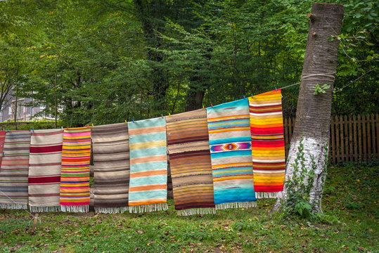 Colorful carpets in Architectural ethnographic complex Etar with typical old bulgarian architecture shows different traditional crafts from 19th century, Bulgaria.