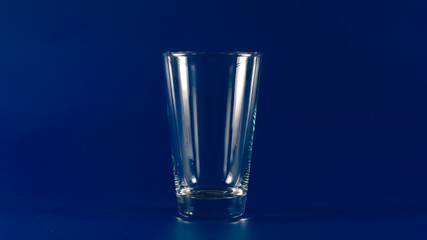 Empty Glass on a blue background