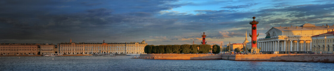 The last rays of sunset over the Neva river and St. Petersburg
