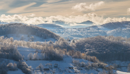 Obraz premium Winter scenery with fresh snow, and storm clouds, in the Transylvanian Alps