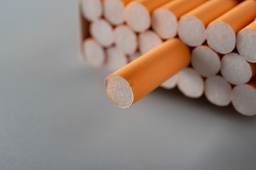 full box of cigarettes on grey background