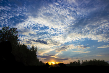 sunset sky setting sun beautiful clouds forest frame