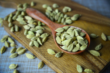 Cardamom Seeds in Wooden Spoon