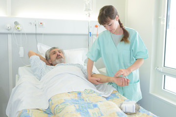 doctor checking a medical report in hospital room