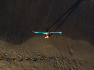vertical longboard surfergirl bali indonesia canguu oldmans mermaid wet girl beach walk