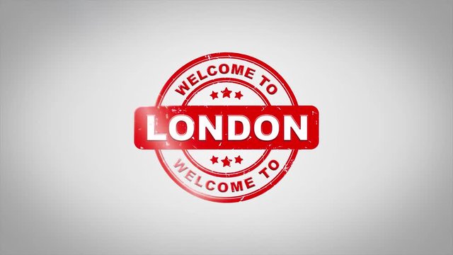 Welcome to LONDON Signed Stamping Text Wooden Stamp Animation. Red Ink on Clean White Paper Surface Background with Green matte Background Included.