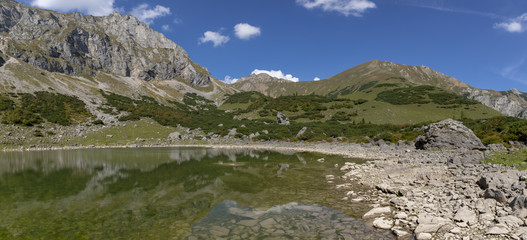 panorama view mountain lake Krumpensee on Eisenerzer Reichenstein, a mountain in the Ennstal Alps in the Austrian federal state of Styria
