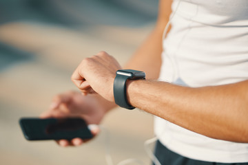 Person using smart watch close-up hands